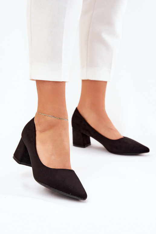 Women's pointed toe pumps on a heel...