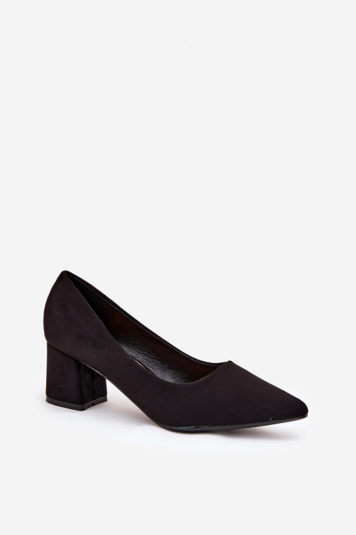 Women's pointed toe pumps on a heel...