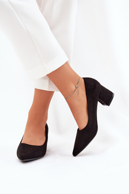 Women's pointed toe pumps on a heel...
