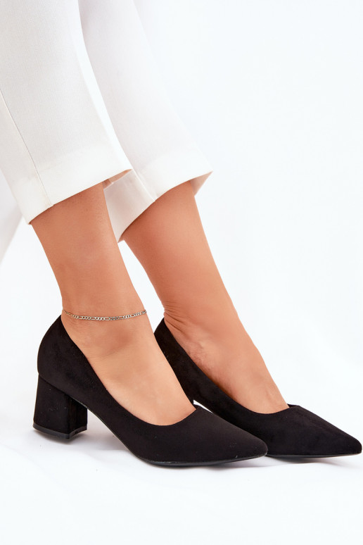 Women's pointed toe pumps on a heel...