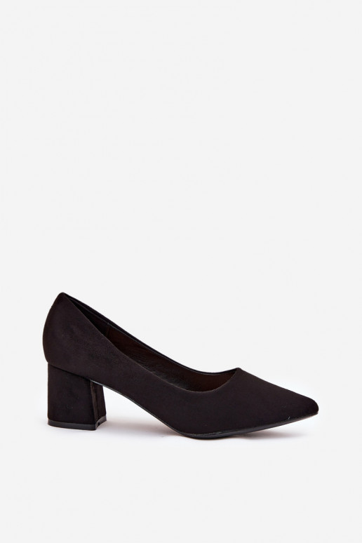 Women's pointed toe pumps on a heel...