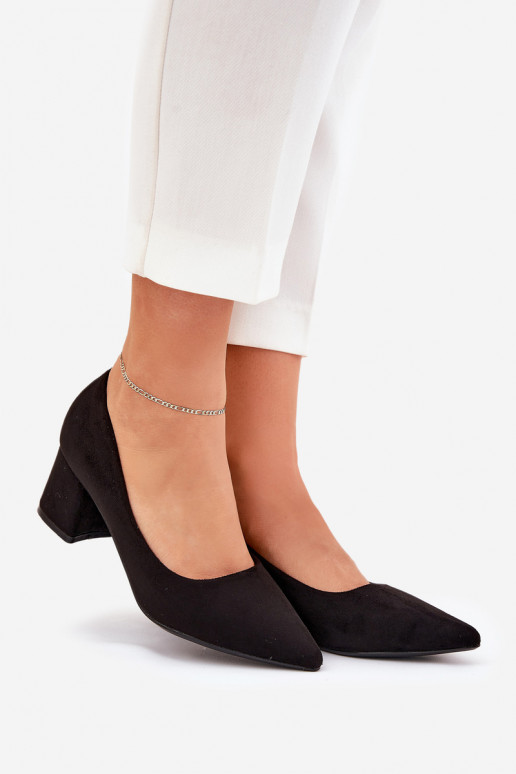 Women's pointed toe pumps on a heel...