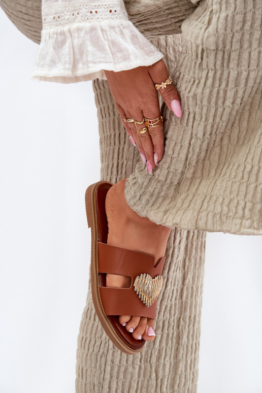 Womens sandals on a flat heel with a gold decoration Karinma