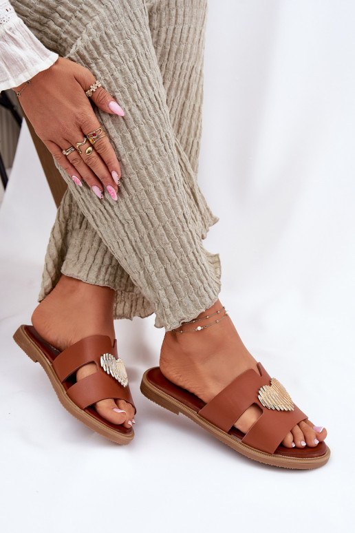 Womens sandals on a flat heel with a gold decoration Karinma