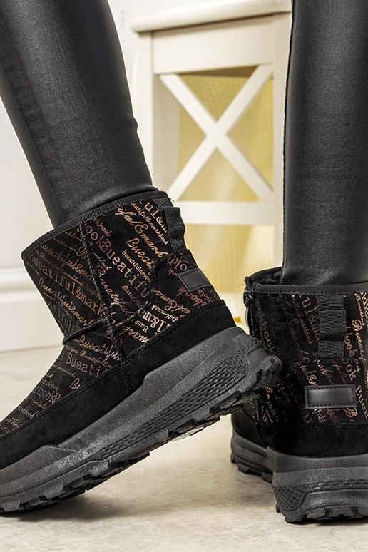 Black and gold women's snow boots...