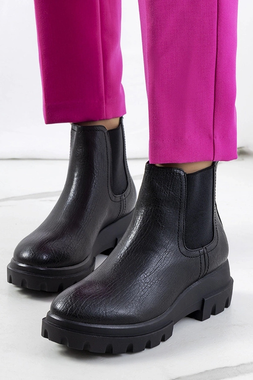 Black patent leather insulated boots...