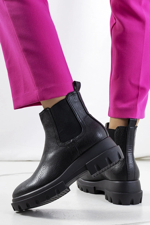 Black patent leather insulated boots...
