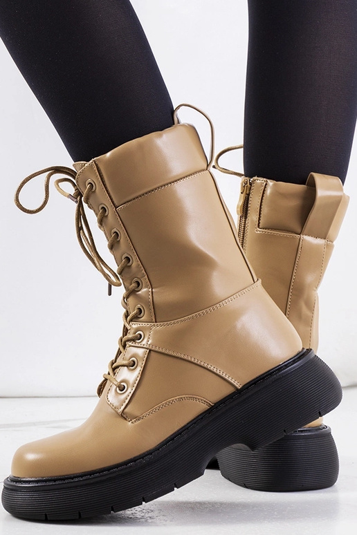 Black patent leather insulated boots...