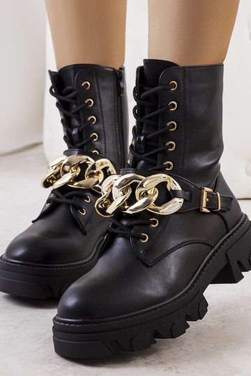 Beige insulated boots with chain Harrison