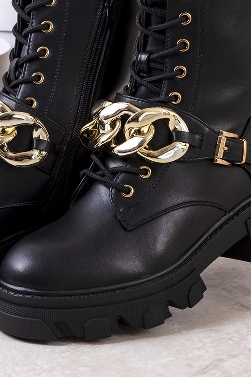 Beige insulated boots with chain...