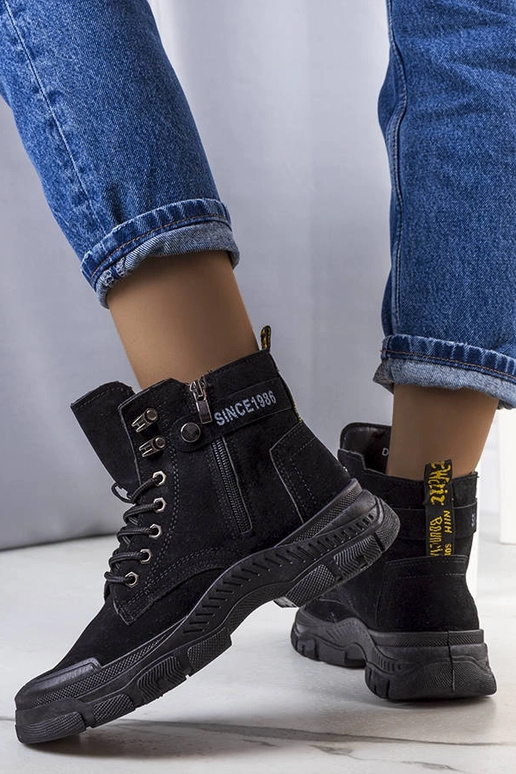 Beige insulated boots with chain...