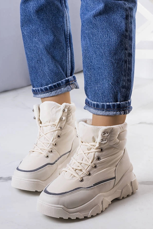 Beige insulated boots with chain...