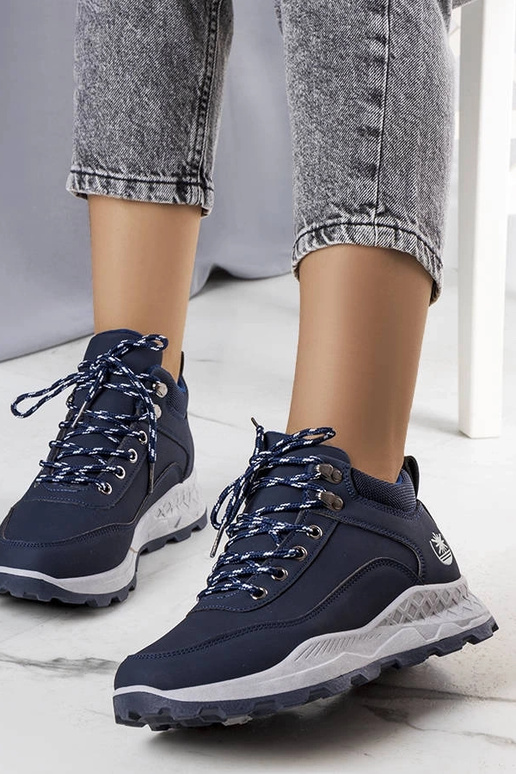 Beige insulated boots with chain...