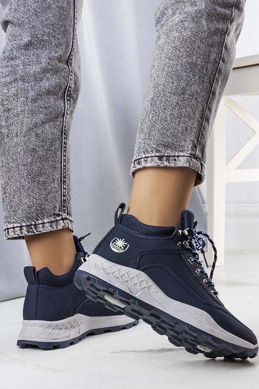 Beige insulated boots with chain...