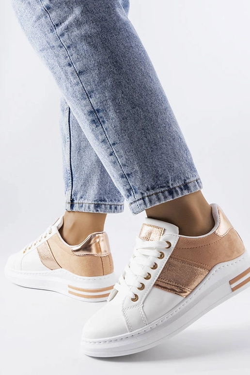 Białe sneakersy z różowymi wstawkami...