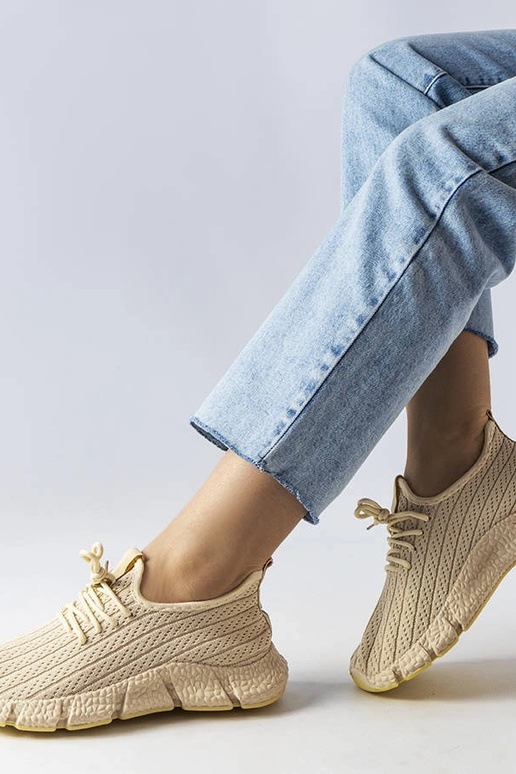 Jasnobeżowe sportowe sneakersy Élodie