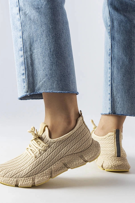 Jasnobeżowe sportowe sneakersy Élodie