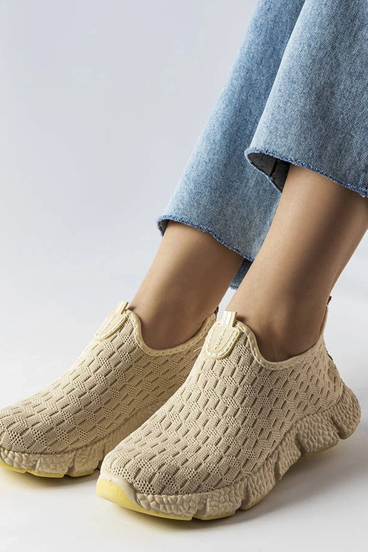 Jasnobeżowe sportowe sneakersy...