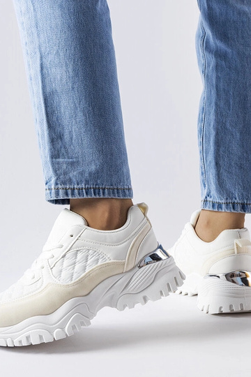 Białe sneakersy ze srebrną...