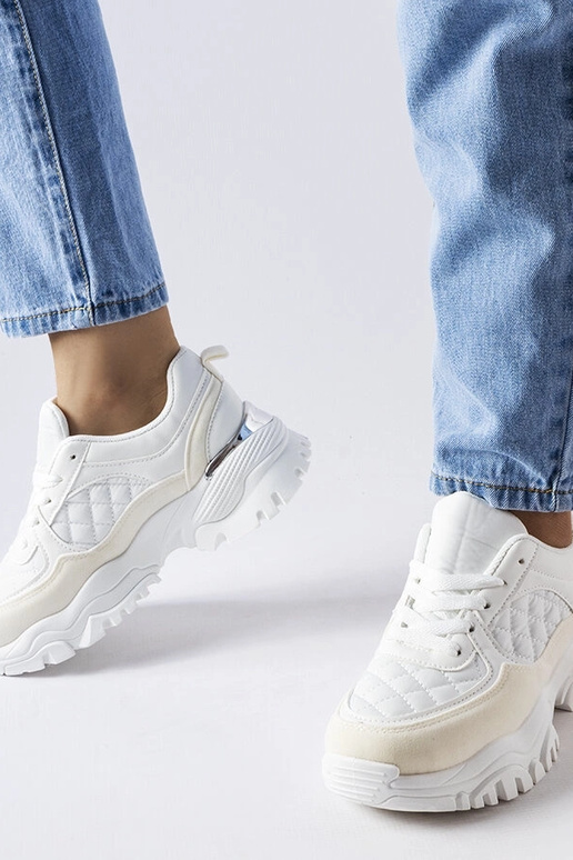 Białe sneakersy ze srebrną wstawką...