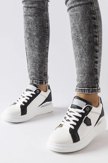 Biało-czarne sneakersy ze srebrnym akcentem Via