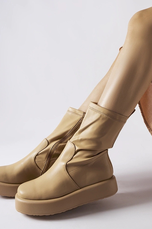 Black patent leather insulated boots...