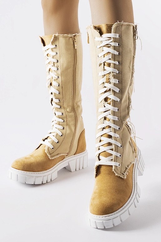 Beżowe materiałowe ocieplane kozaki...