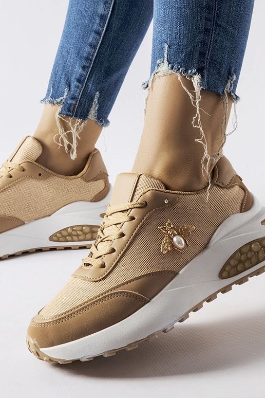 Brązowo-białe sneakersy z ozdobna...