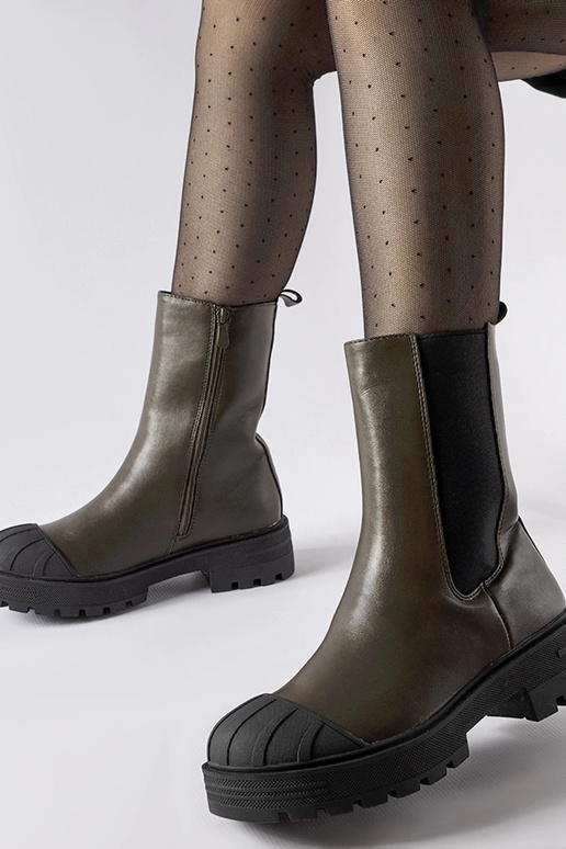 Beige insulated boots with chain...