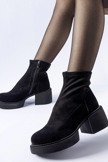 Black wedge heeled boots...