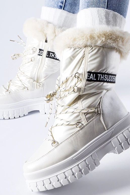 Beżowe ocieplane śniegowce z napisem...