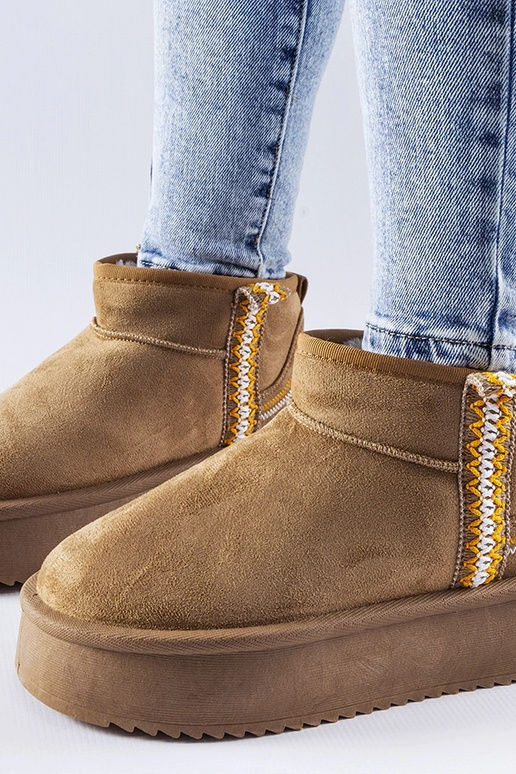 Ciemnobeżowe śniegowce na platformie...