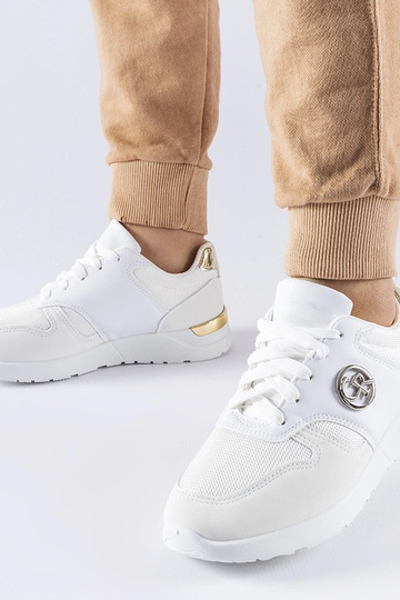 Białe sportowe sneakersy...