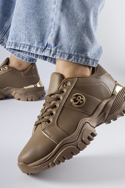 Brązowe sneakersy na masywnej...