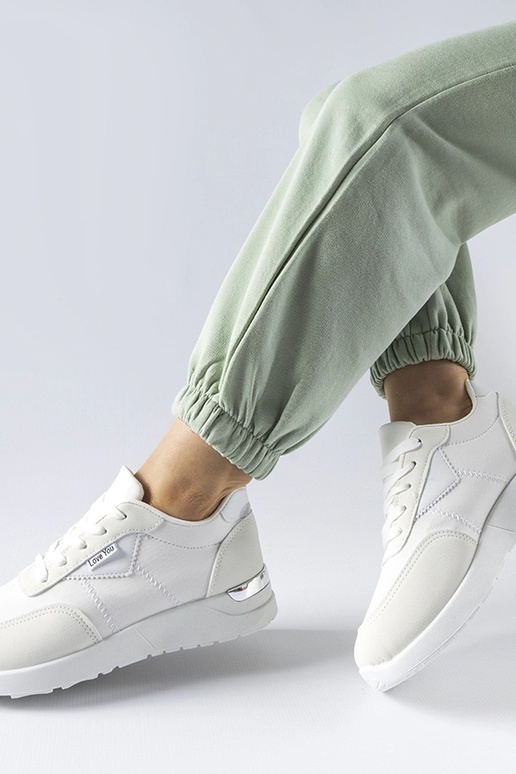 Białe materiałowe sneakersy Geraldino