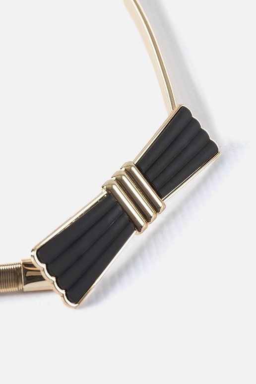 Złoty elastyczny pasek z kokardką...