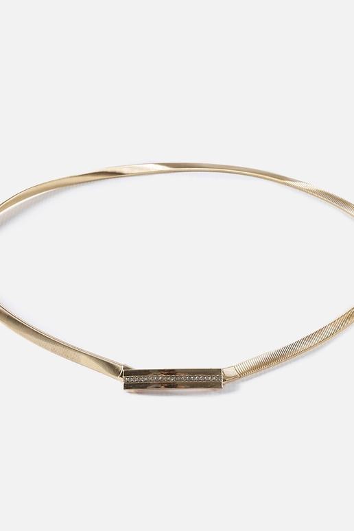 Złoty elastyczny pasek z cyrkoniami...