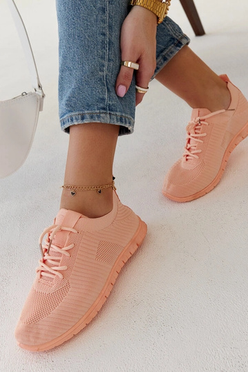 Pink sports sneakers by...