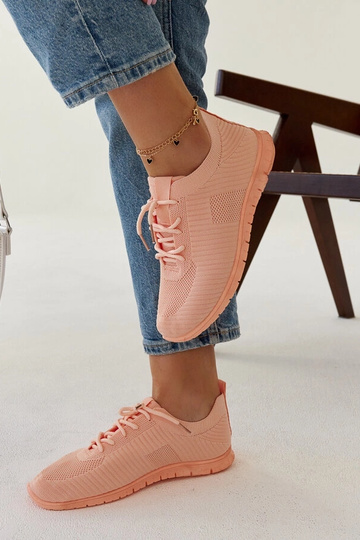 Pink sports sneakers by... 2