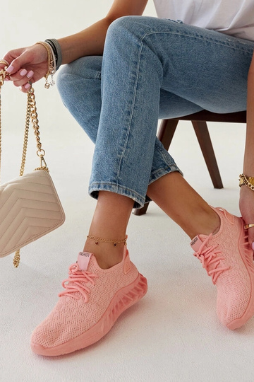 Pink sports sneakers by...