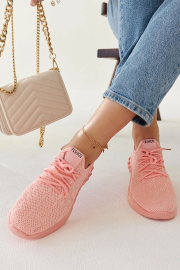Pink sports sneakers by... 2
