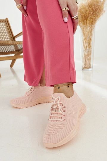 Pink sports sneakers by...