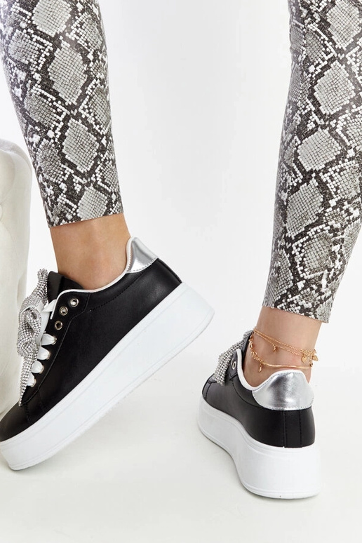 Czarne sneakersy na wysokiej... Czarne sneakersy na wysokiej...