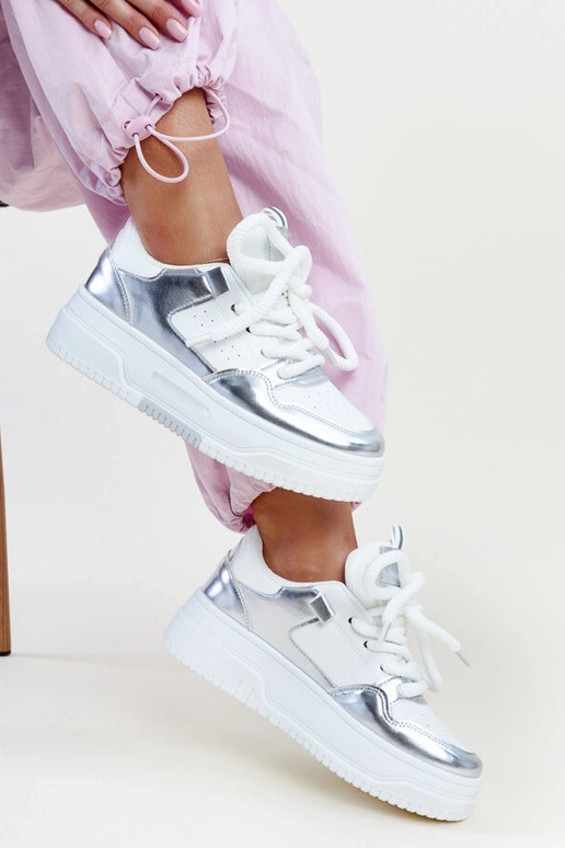 Biało-srebrne sneakersy na wysokiej...