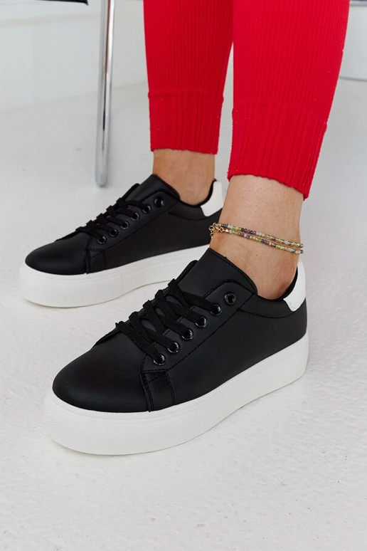 Czarno-białe sneakersy na grubej...