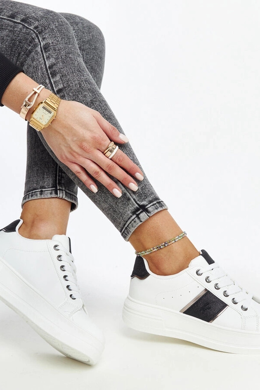 Biało-czarne sneakersy na grubszej...