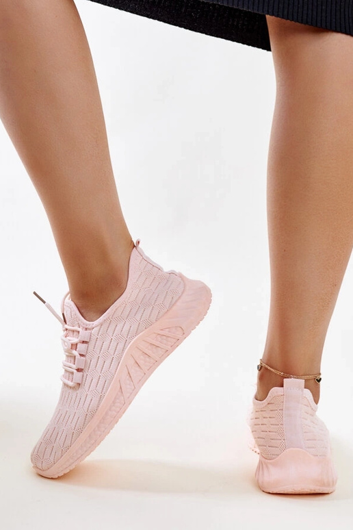 Pink sports sneakers by Donatil