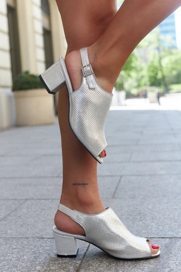 Black sandals on a block...