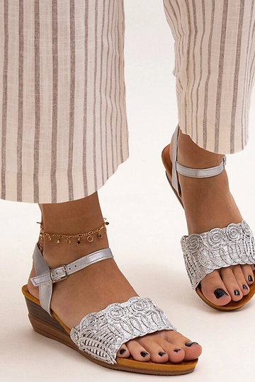 Black sandals on a block... 2