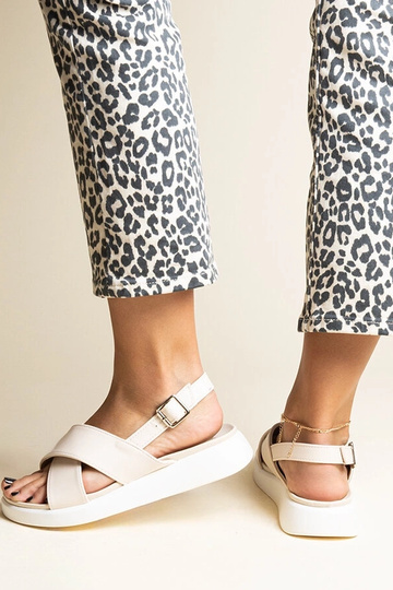 Black sandals on a block...